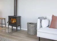 Litinová krbová kamna JOTUL F 100 ECO LL ČERNÝ LAK - v interiéru