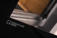 Krbová plechová kamna HS FLAMINGO AQUAFLAM VARIO BARMA 11/7 logo detail